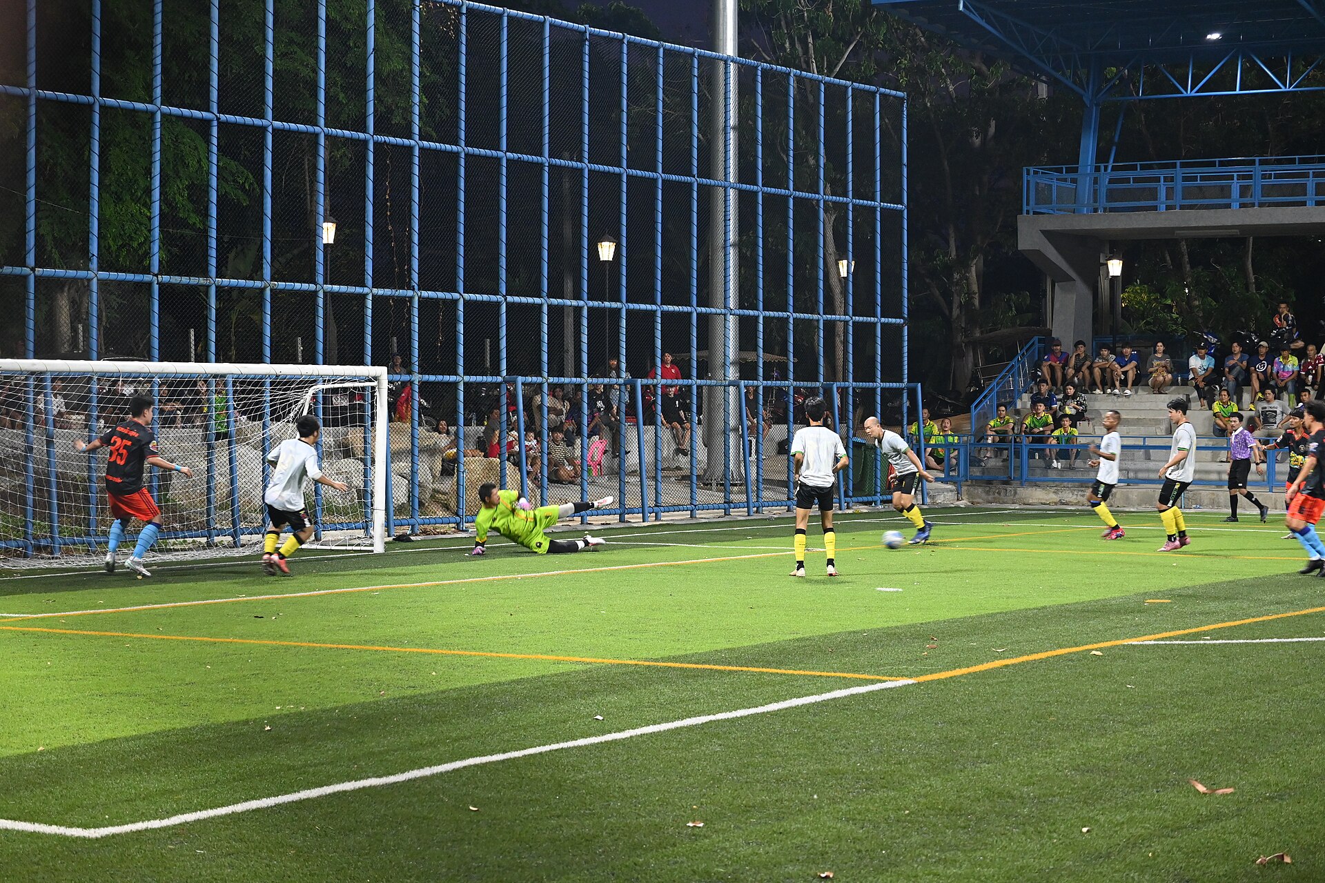 Goalkeeper in empty stadium